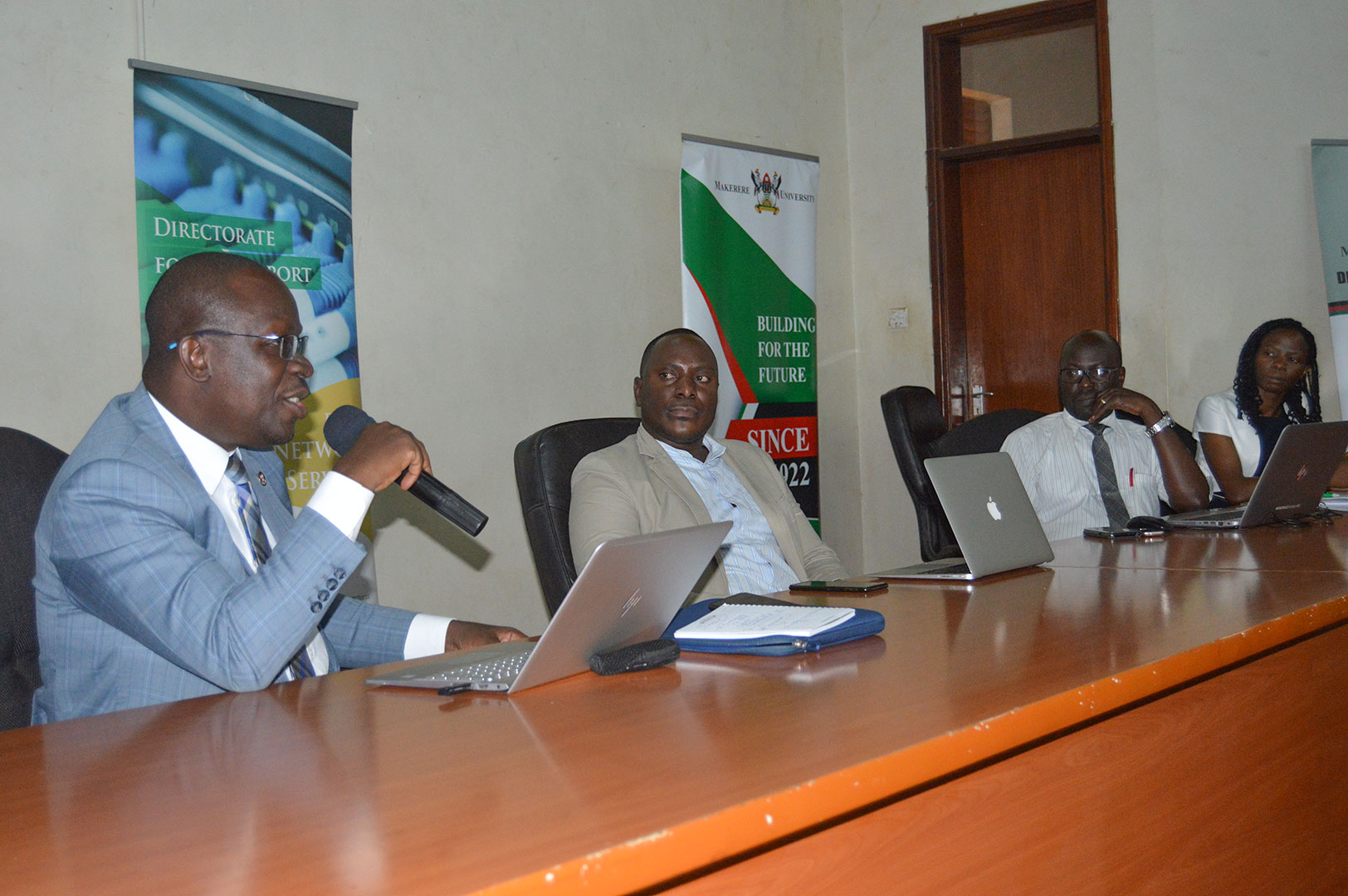 The PPRO. Rita Namisango (Right) , Prof. Paul Birevu Muyinda (2nd from Right) , and the Director DICTS-Mr. Samuel Paul Mugabi (3rd from Right) listens as Mr. Hussein Isingoma responds to a question during the Social Media Workshop on 13th February 2020, Conference Hall, CEDAT, Makerere University, Kampala Uganda.